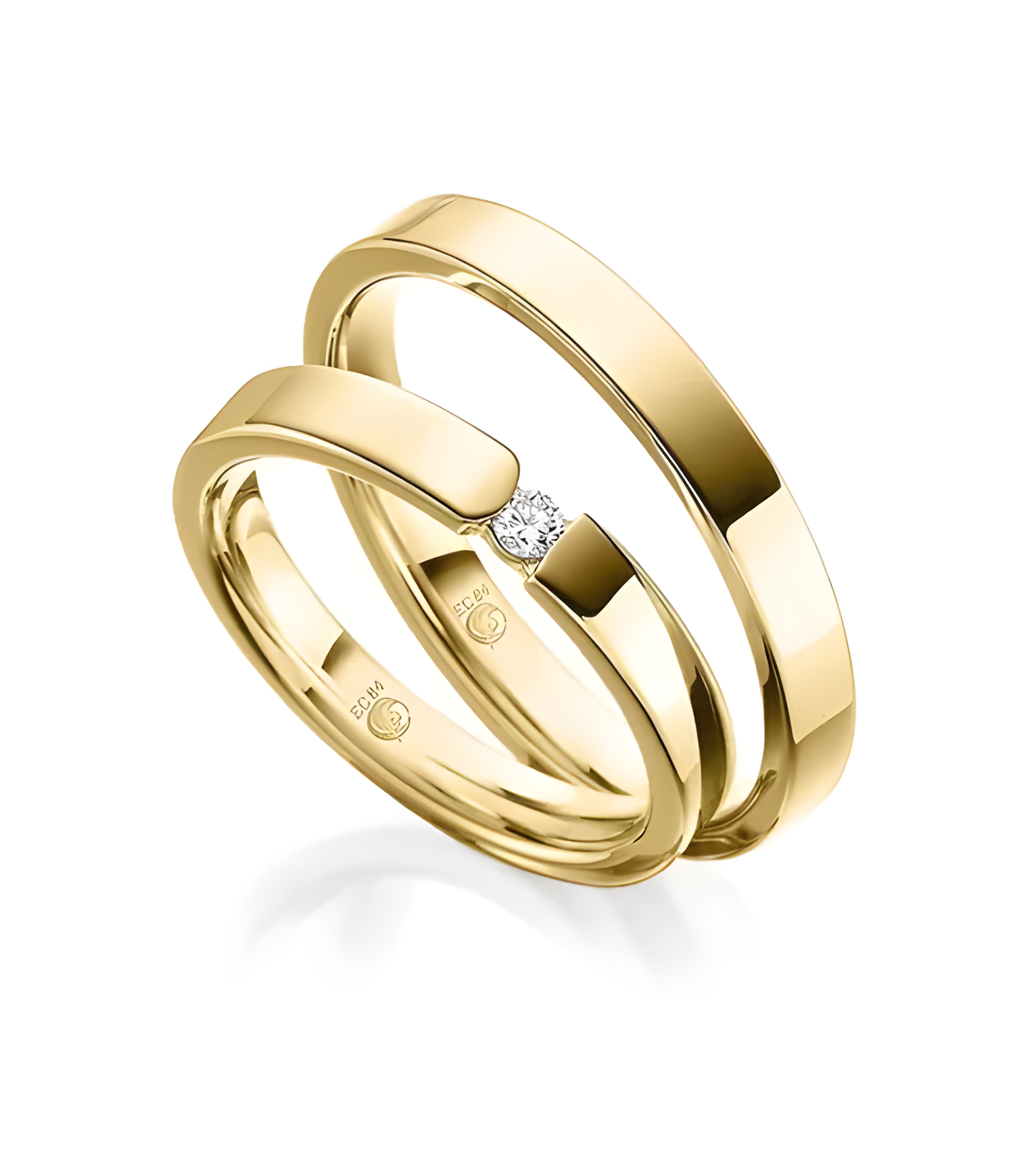 Alianzas de boda de oro con dos diamantes talla princesa