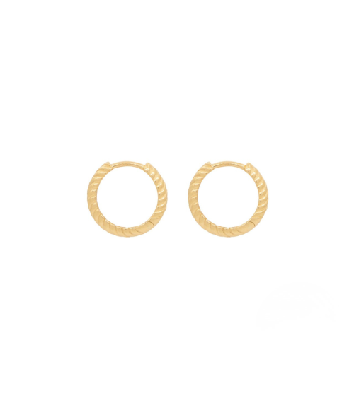 Aros ovalados de oro de 18 quilates con un diamante | Staring